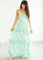 Woman wearing a floral dress on a white background