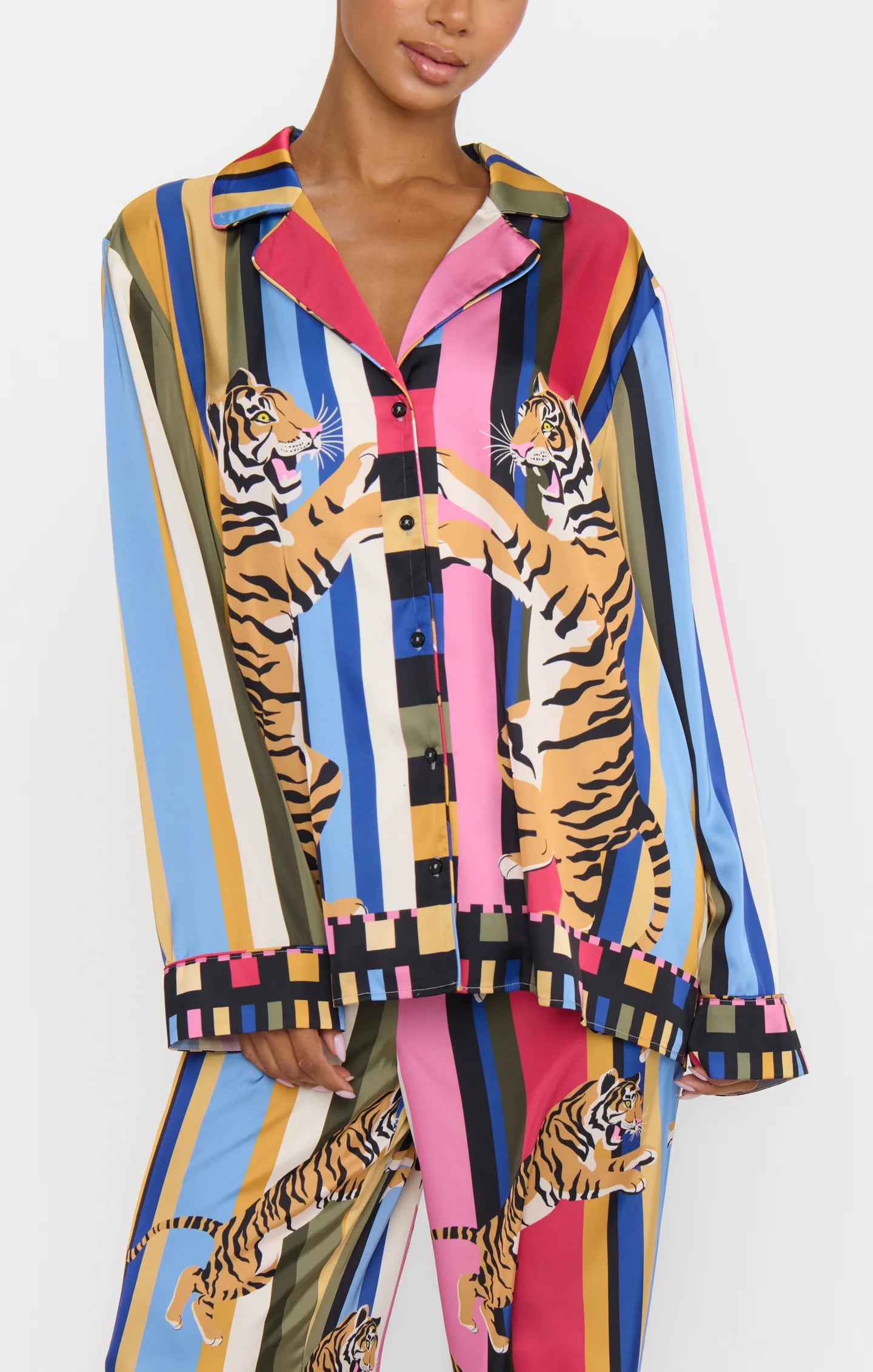 Colorful outfit with tiger print on a white background