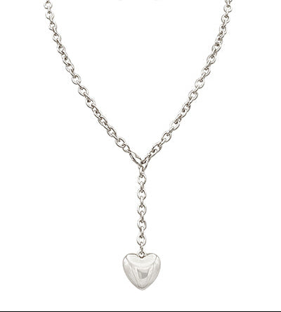 Silver necklace with a heart pendant on a white background
