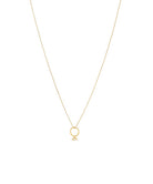 Gold necklace with a small ring pendant on a white background