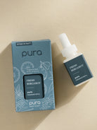 Pura Fresh Bergamot fragrance refill bottle and packaging on a beige background