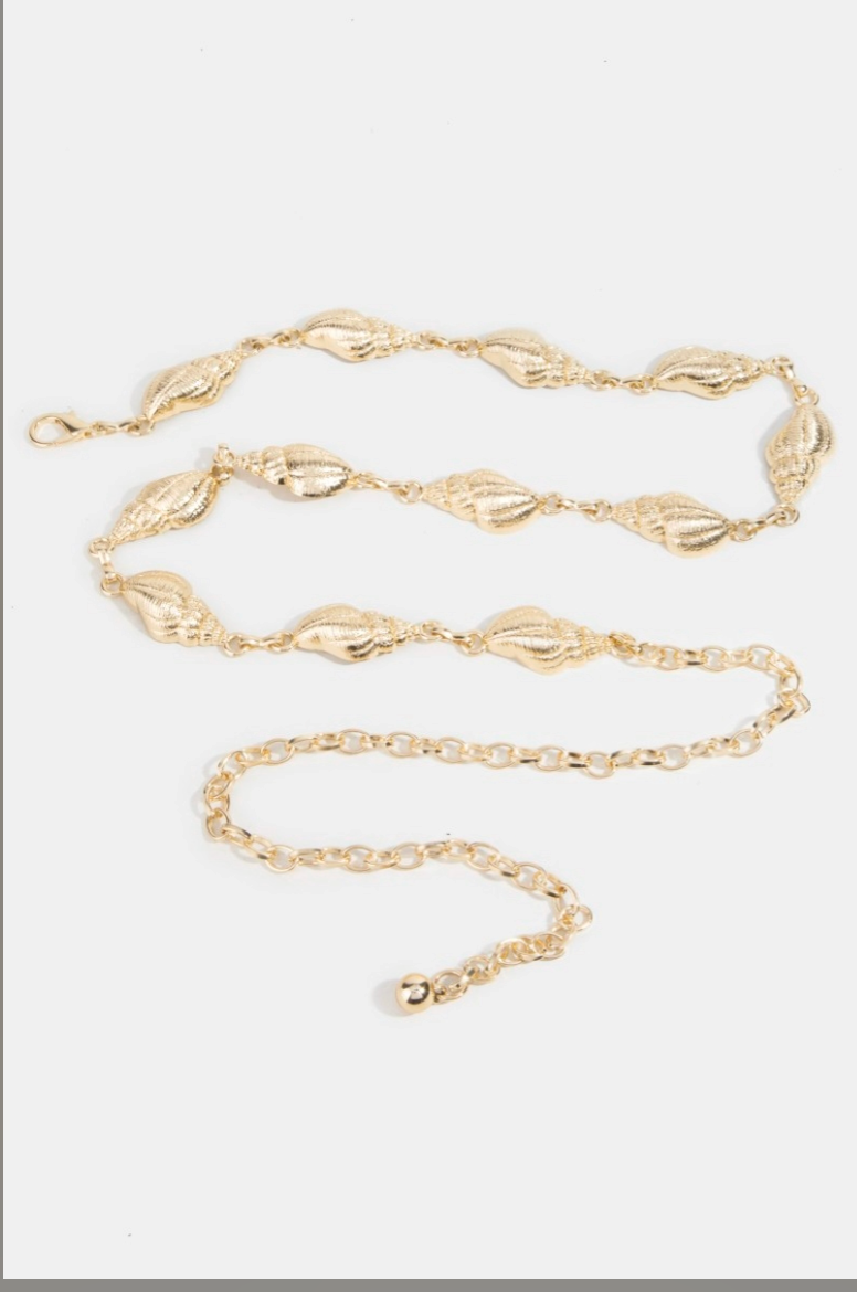 Gold seashell chain belt on a white background