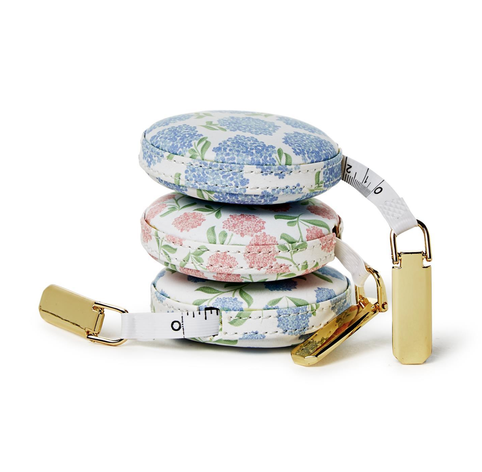 Retractable measuring tape with floral design on a white background
