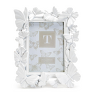 White butterfly-themed picture frame on a white background