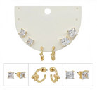 Gold-plated jewelry set featuring square clear crystal stud earrings, huggie hoop earrings, and twisted knot stud earrings, displayed on an off-white card with three detail inset views at the bottom.