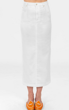 White denim skirt worn by a person on a white background