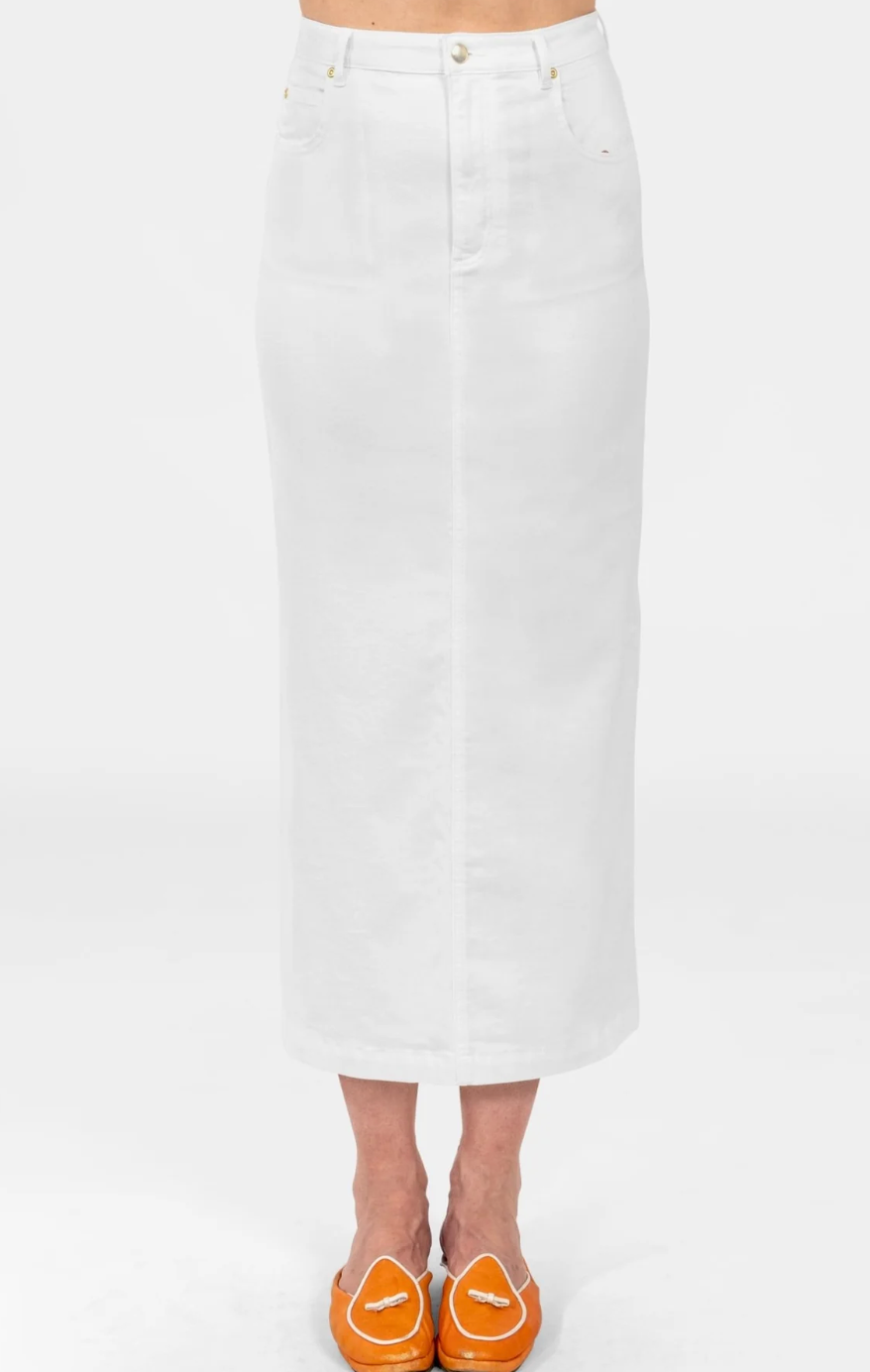 White denim skirt worn by a person on a white background