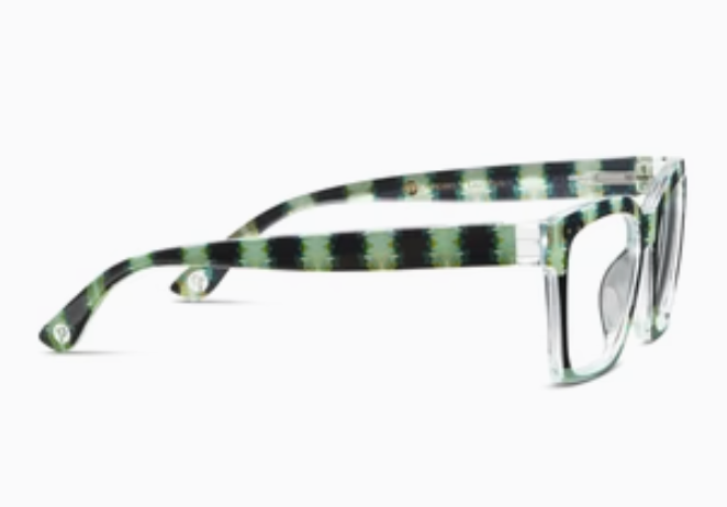 Eyeglasses with striped green and black frame on a white background