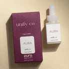 Unify Co. Aura fragrance refill bottle and packaging on a beige background
