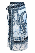 A wrap-style midi skirt featuring a blue and white paisley pattern with a matching tie belt at the waist, shown against a plain white background.