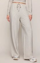 Wide-leg heather gray pants with an elastic drawstring waistband and side pockets.