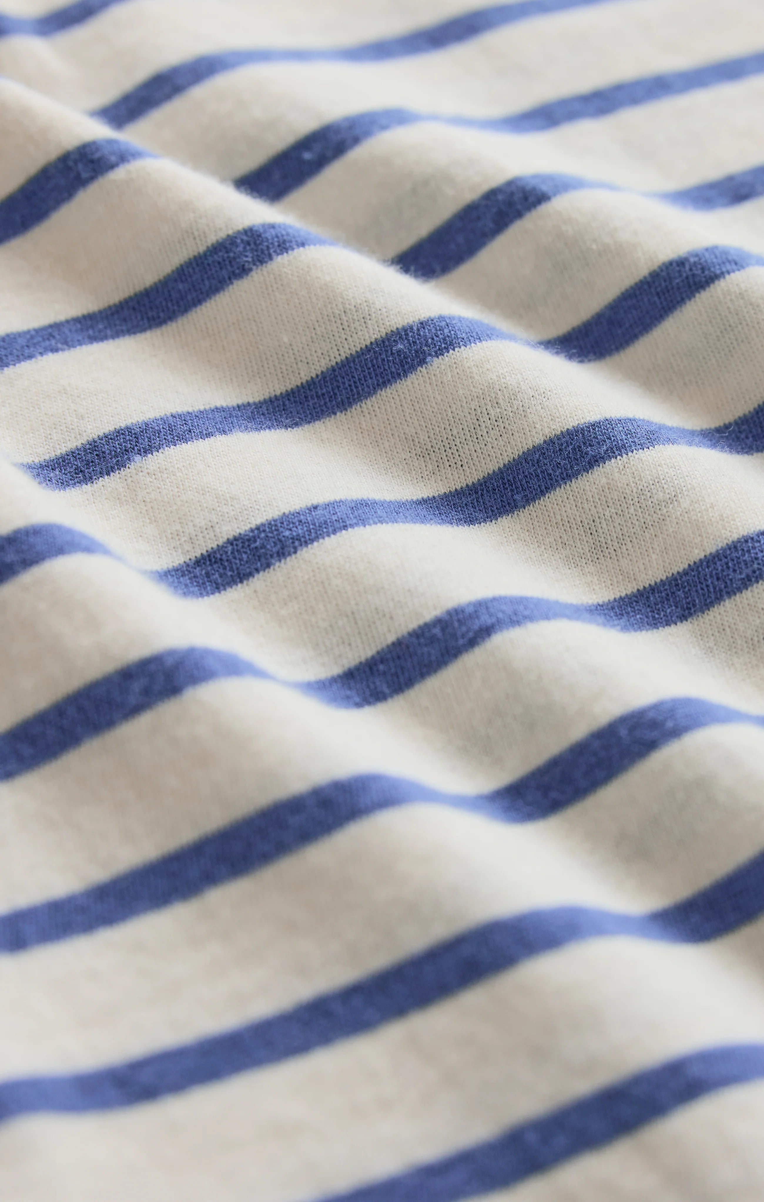 Close-up of fabric with blue and white stripes