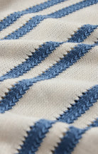 Close-up of fabric with blue and white striped pattern