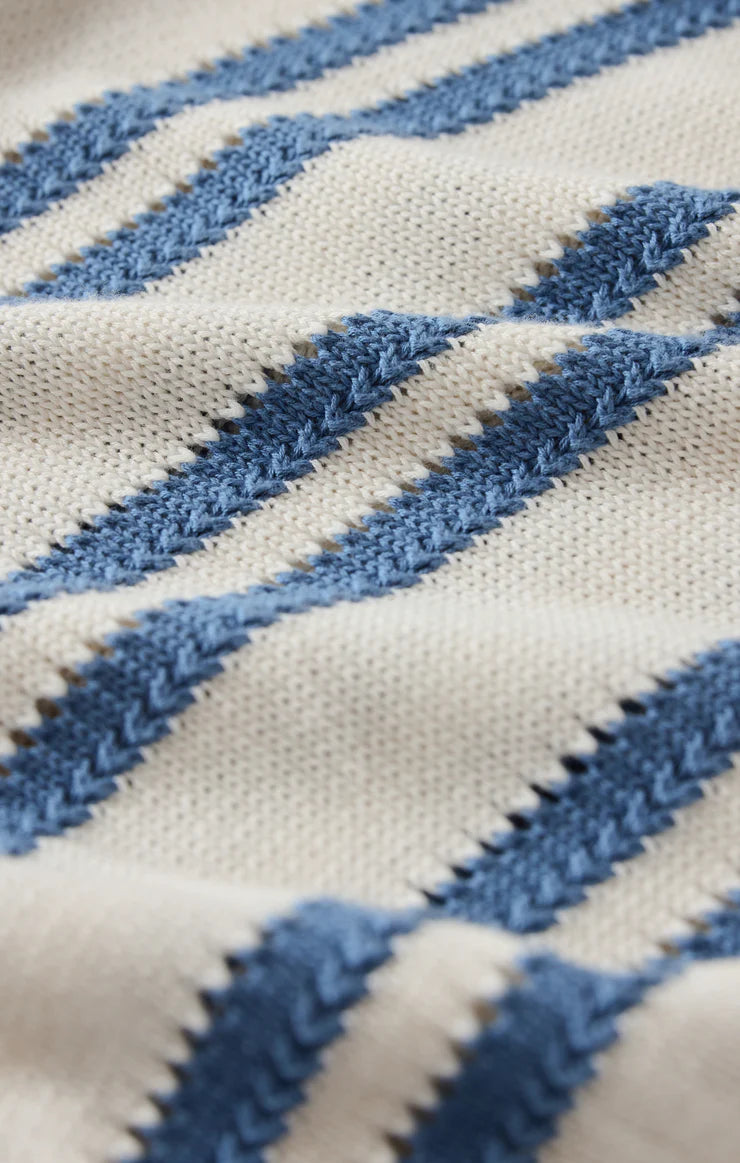 Close-up of fabric with blue and white striped pattern