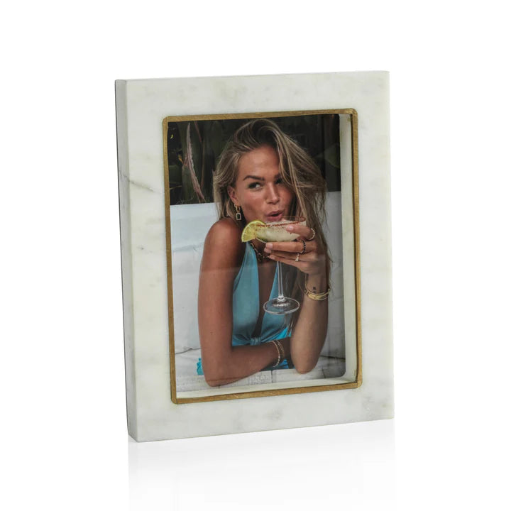 Marble photo frame with a woman holding a cocktail inside
