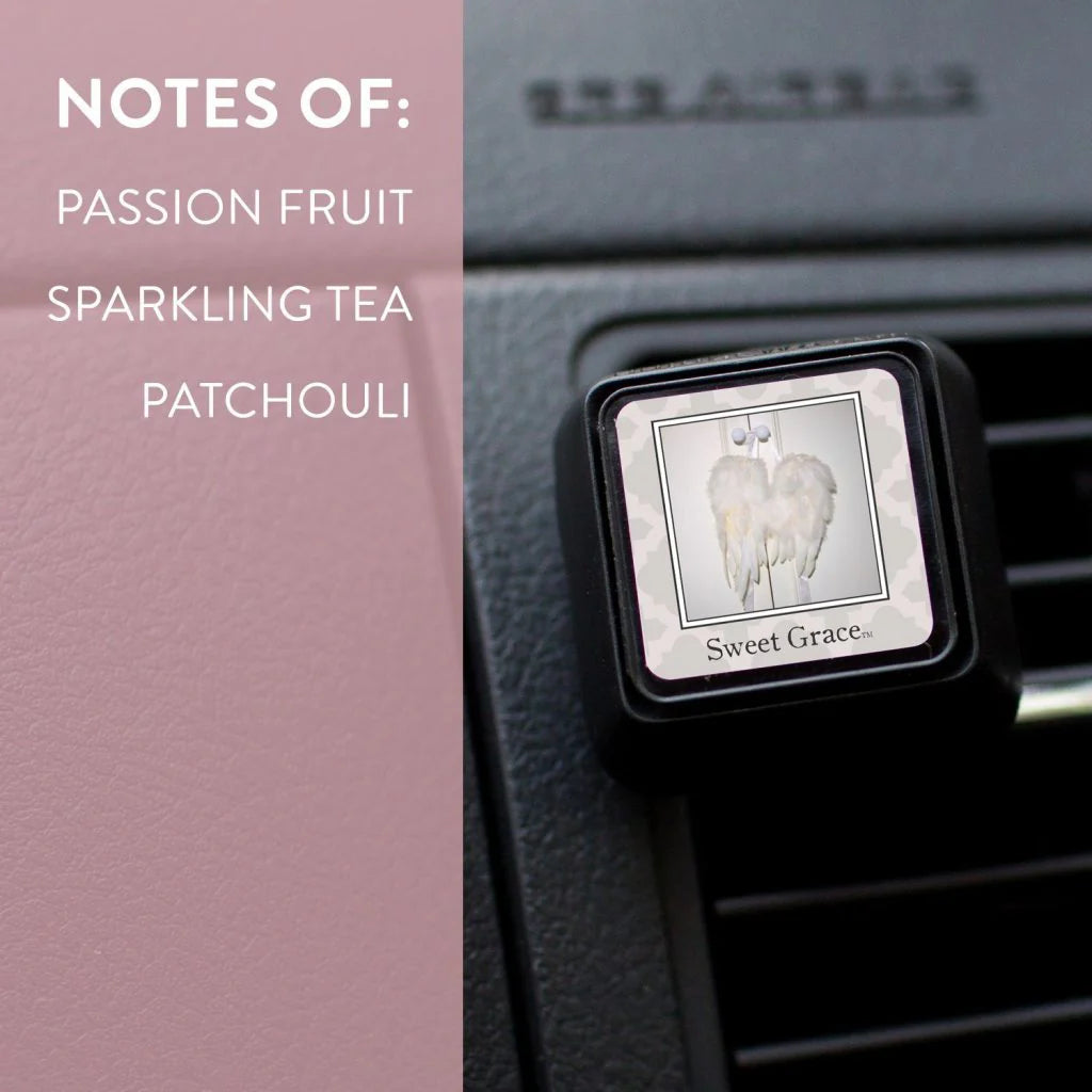 Car air freshener with 'Sweet Grace' label and fragrance notes on a car interior background