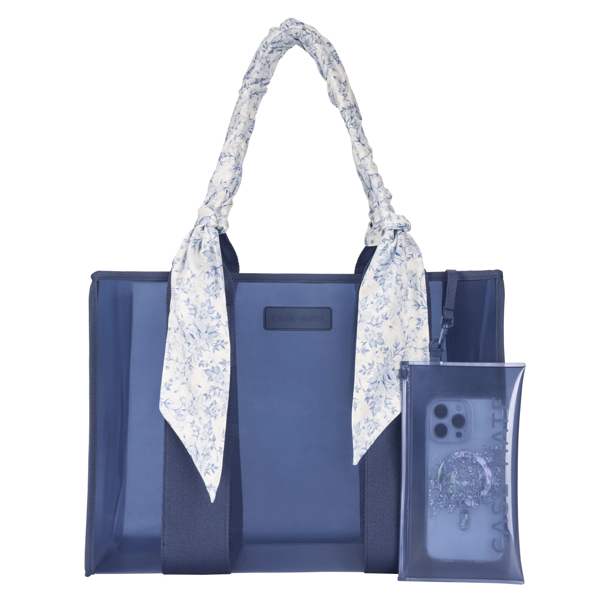 Blue tote bag with floral handle and clear phone case on a white background