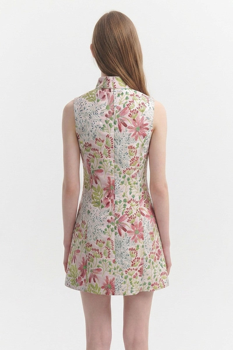 Woman wearing a floral dress on a white background