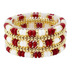 A stack of beaded stretch bracelets featuring alternating red and white beads with shiny gold metallic spacer beads, displayed on a clean white background.