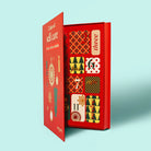 Red advent calendar with patterned sections on a light blue background