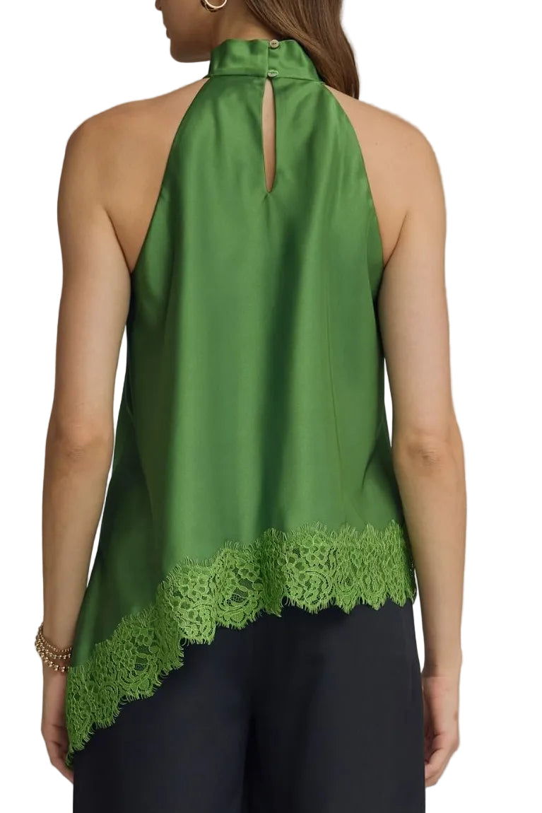 Green halter top with lace detail worn by a person on a gray background