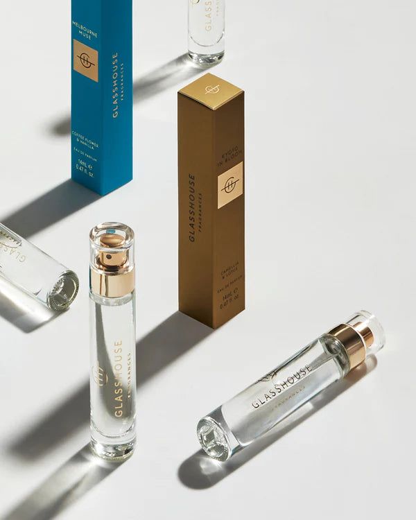 Glasshouse perfume bottles with packaging on a light background