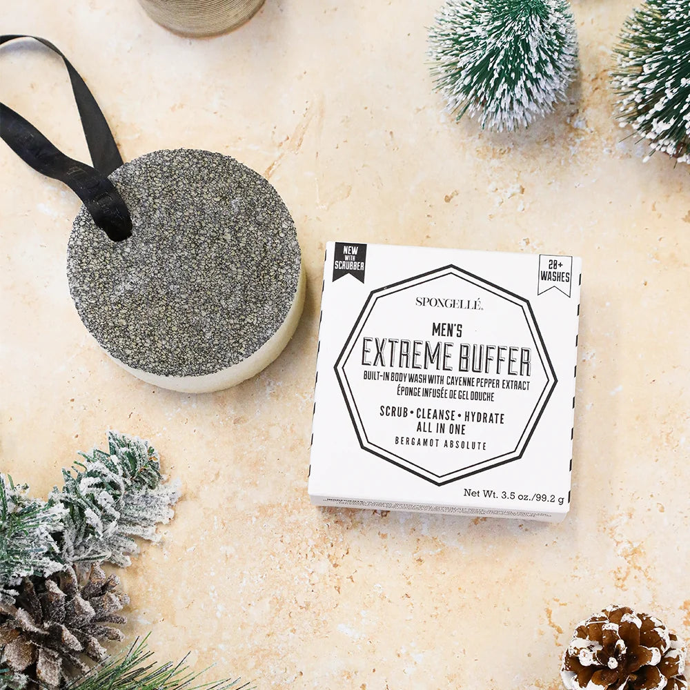 Men's Extreme Buffer with packaging on a textured surface with decorative elements