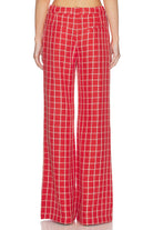 Red plaid pants on a white background