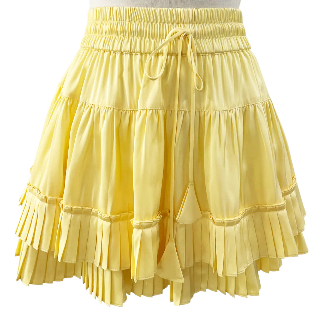 Yellow ruffled skirt on a white background
